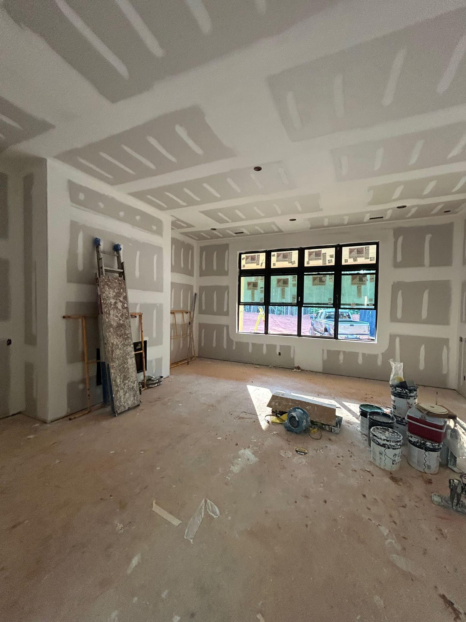 Drywall finishing on coffered ceiling and walls before paint