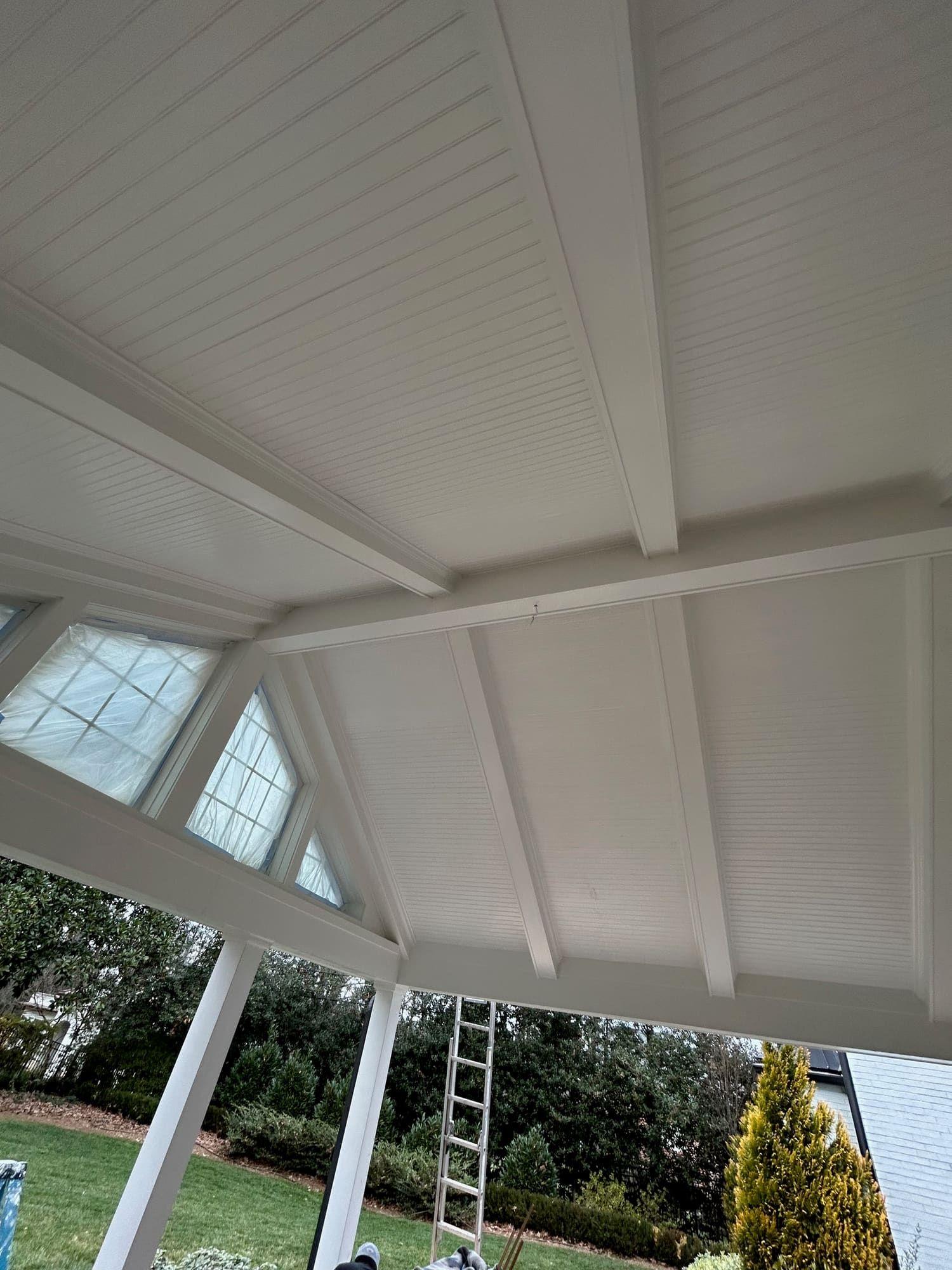 White beadboard porch ceiling and gable trim, wide angle
