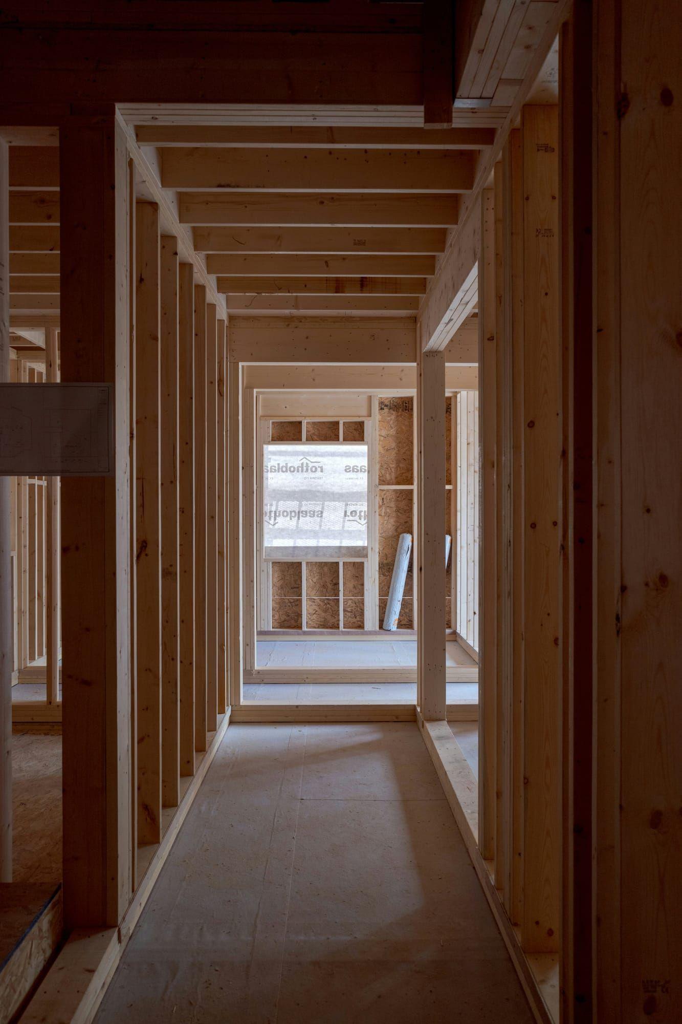 Framed interior hallway and rooms during new construction