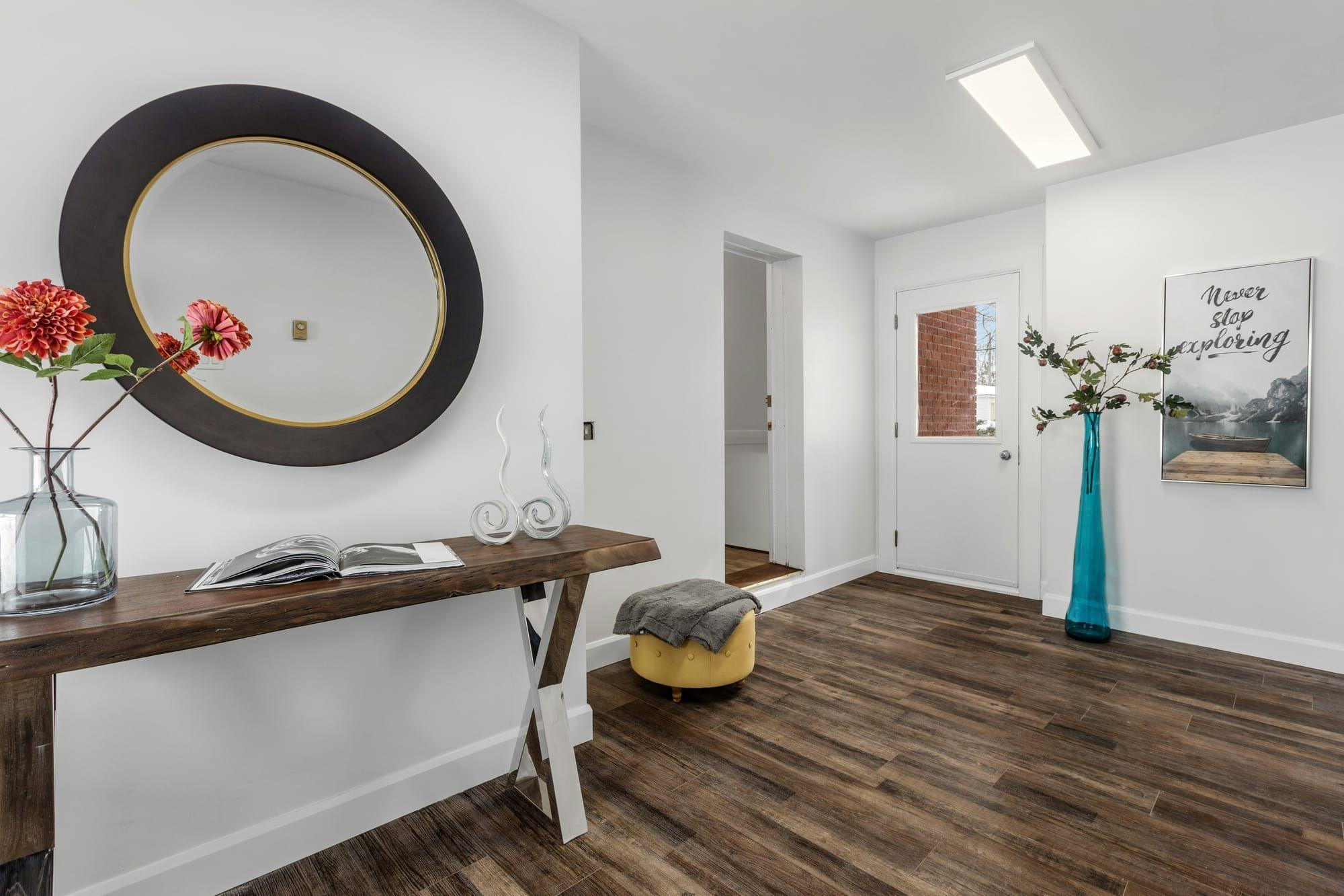 Entryway with dark wood-look plank flooring